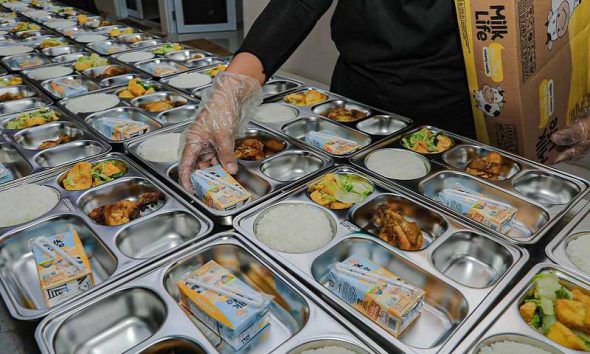 Ilustrasi program Makan Bergizi Gratis (MBG).