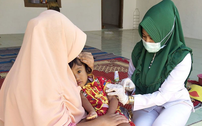 Ilustrasi bidan Desa